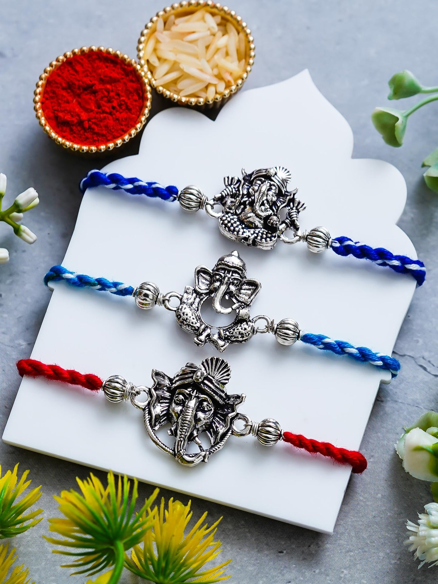 Ganesh Rakhi Set of 3 – Traditional Metal Rakhis – Free Chawal & Kumkum