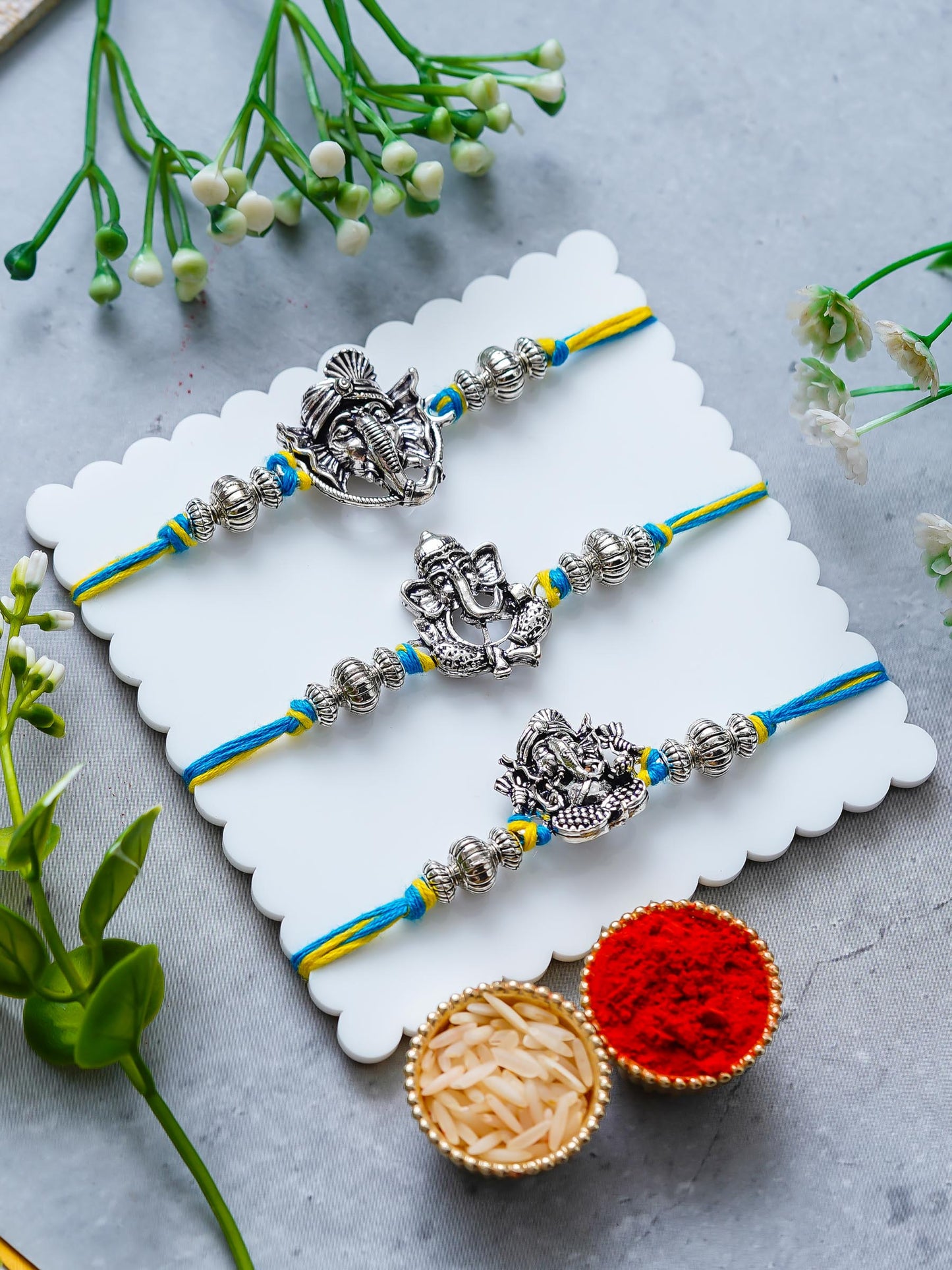 Lord Ganesha Rakhi Set of 3 – Antique Metal Finish – Free Chawal & Kumkum