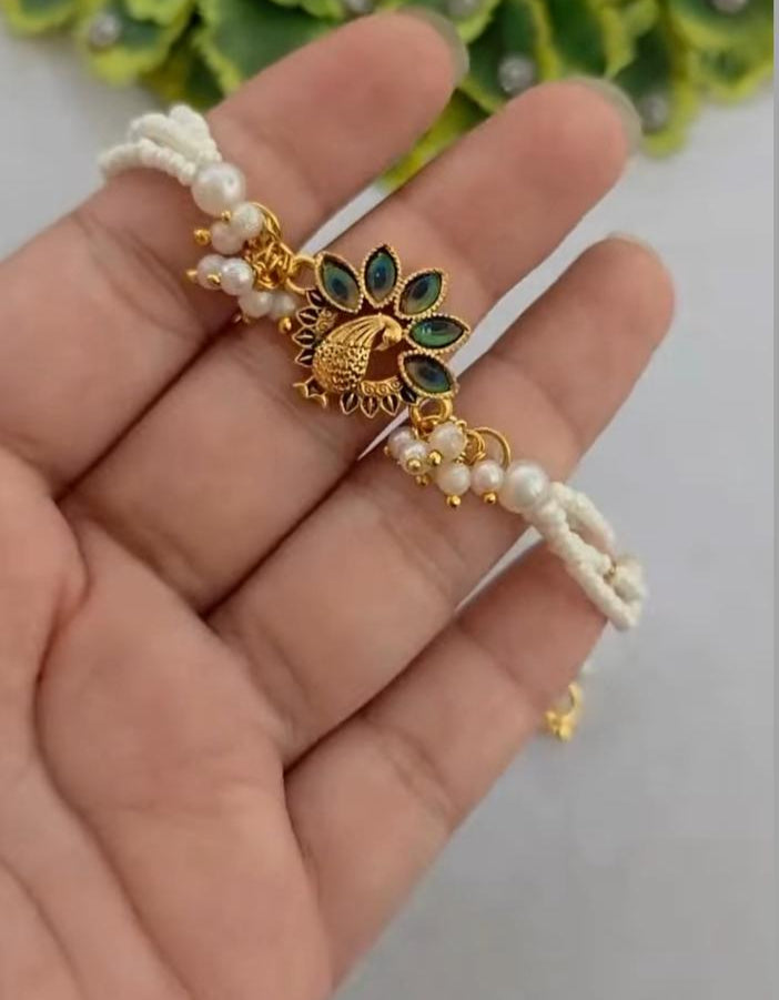 Graceful White Pearl Rakhi ๐ธ