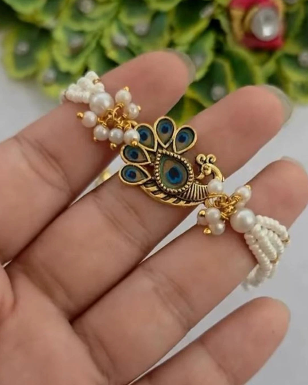 Handmade Pearl Mayuri  with Free Chawal & Kumkum
