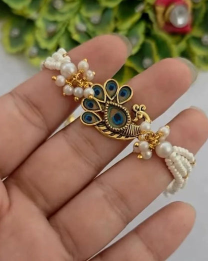 Handmade Pearl Mayuri  with Free Chawal & Kumkum