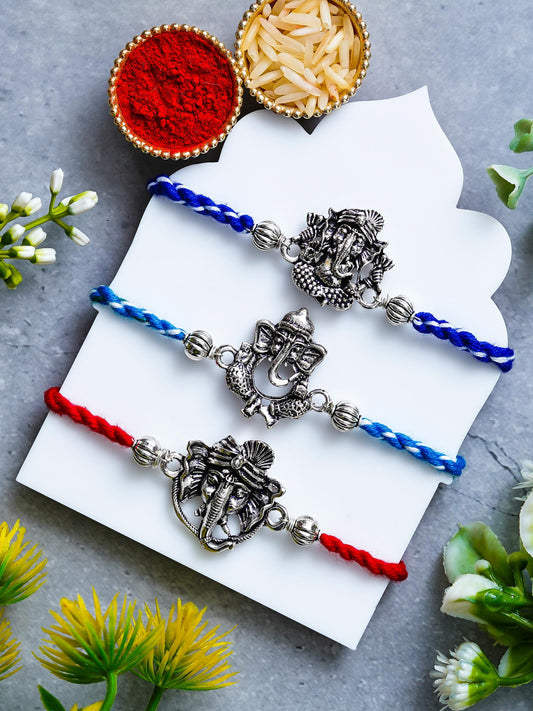 Ganesh Rakhi Set of 3 – Traditional Metal Rakhis – Free Chawal & Kumkum